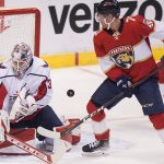
              Florida Panthers right wing Patric Hornqvist (70) watches as Washington Capitals goalie Ilya Samsonov (30) deflects a puck during the first period of an NHL hockey game, Thursday, Nov. 4, 2021, in Sunrise, Fla. (AP Photo/Wilfredo Lee)
            