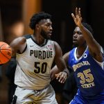 
              Indiana State forward Dearon Tucker (35) defends Purdue forward Trevion Williams (50) during the second half of an NCAA college basketball game in West Lafayette, Ind., Friday, Nov. 12, 2021. (AP Photo/Michael Conroy)
            