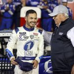 
              FILE - Car owner Rick Hendrick, right, congratulates Kyle Larson in victory lane after Larson won the NASCAR Cup Series auto race at Charlotte Motor Speedway in Concord, N.C., Sunday, May 30, 2021. The NASCAR championship will pit Rick Hendrick against Joe Gibbs as both team owners put a pair of drivers in the final four. Chase Elliott and Kyle Larson will represent Hendrick in a pair of Chevrolets. Gibbs will field Toyotas for Denny Hamlin and Martin Truex Jr.  (AP Photo/Nell Redmond, File)
            