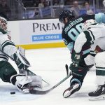 
              Seattle Kraken left wing Marcus Johansson (90) gets a power-play goal past Minnesota Wild goaltender Cam Talbot (33) during the third period of an NHL hockey game Saturday, Nov. 13, 2021, in Seattle. The Wild won 4-2. (AP Photo/Ted S. Warren)
            