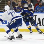 
              St. Louis Blues' Ivan Barbashev (49) controls the puck ad Tampa Bay Lightning's Victor Hedman (77) defends during the second period of an NHL hockey game Tuesday, Nov. 30, 2021, in St. Louis. (AP Photo/Scott Kane)
            