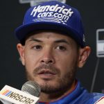 
              Driver Kyle Larson speaks during media day ahead of Sunday's NASCAR Cup Series championship auto race on Thursday, Nov. 4, 2021, in Phoenix. (AP Photo/Rick Scuteri)
            