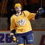 
              Nashville Predators left wing Filip Forsberg waves to the crowd as he is named the first star of the game after an NHL hockey game against the Columbus Blue Jackets Tuesday, Nov. 30, 2021, in Nashville, Tenn. Forsberg scored four goals in the game. (AP Photo/Mark Humphrey)
            