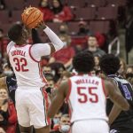 
              Ohio State's E.J. Liddell shoots against Niagara as teammate Jamari Wheeler watches during the first half of an NCAA college basketball game in Columbus, Ohio, Friday, Nov 12, 2021. (AP Photo/Phil Long)
            