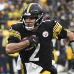 
              Pittsburgh Steelers quarterback Mason Rudolph (2) takes off on a 26-yard scramble during the second half of an NFL football game against the Detroit Lions in Pittsburgh, Sunday, Nov. 14, 2021. (AP Photo/Don Wright)
            