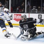 
              St. Louis Blues left wing David Perron (57) scores past Los Angeles Kings goaltender Jonathan Quick (32) during the shootout in an NHL hockey game Wednesday, Nov. 3, 2021, in Los Angeles. (AP Photo/Kyusung Gong)
            