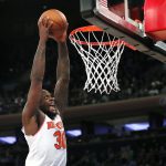 
              New York Knicks forward Julius Randle (30) goes to the basket for a dunk against the Cleveland Cavaliers during the second half of an NBA basketball game in New York, Sunday, Nov. 7, 2021. (AP Photo/Noah K. Murray)
            