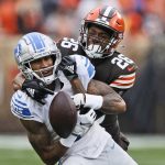 
              Cleveland Browns cornerback Greedy Williams (26) breaks up a pass intended for Detroit Lions wide receiver Josh Reynolds (8) during the first half of an NFL football game, Sunday, Nov. 21, 2021, in Cleveland. (AP Photo/Ron Schwane)
            