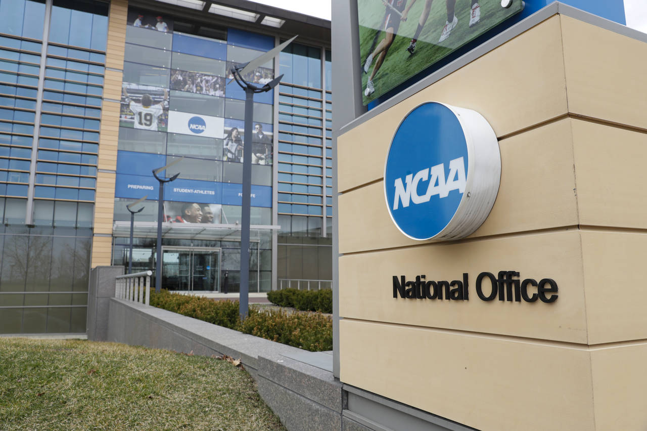 FILE - The NCAA headquarters in Indianapolis is shown in this Thursday, March 12, 2020. The NCAA on...