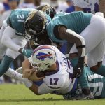
              Buffalo Bills quarterback Josh Allen (17) is sacked by the Jacksonville Jaguars defense during the first half of an NFL football game, Sunday, Nov. 7, 2021, in Jacksonville, Fla. (AP Photo/Phelan M. Ebenhack)
            