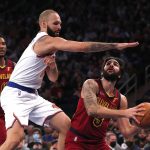 
              New York Knicks guard Evan Fournier (13) defends against Cleveland Cavaliers guard Ricky Rubio (3) during the first half of an NBA basketball game in New York, Sunday, Nov. 7, 2021. (AP Photo/Noah K. Murray)
            