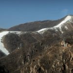 
              A ski run lined with artificial snow is seen at the National Alpine Skiing Center in Yanqing on the outskirts of Beijing, Feb. 5, 2021. The high demand for artificial snow at February's Beijing Winter Olympics will have a minimal effect on the local water supply, a spokesperson for the organizers said Thursday. (AP Photo/Mark Schiefelbein)
            