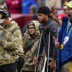 
              Washington Football Team defensive end Chase Young uses crutches on the sideline during the second half of an NFL football game against the Tampa Bay Buccaneers, Sunday, Nov. 14, 2021, in Landover, Md. (AP Photo/Nick Wass)
            