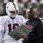 
              Stanford coach David Shaw, right, speaks with quarterback Tanner McKee during the second half of the team's NCAA college football game against Washington State, Saturday, Oct. 16, 2021, in Pullman, Wash. Washington State won 34-31. (AP Photo/Young Kwak)
            