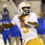
              Tennessee quarterback Hendon Hooker (5) throws a pass during the first half of an NCAA college football game against Kentucky in Lexington, Ky., Saturday, Nov. 6, 2021. (AP Photo/Michael Clubb)
            
