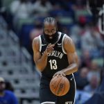 
              Brooklyn Nets guard James Harden (13) reacts and points down court in the first half of an NBA basketball game against the New Orleans Pelicans in New Orleans, Friday, Nov. 12, 2021. The Nets won 120-112. (AP Photo/Gerald Herbert)
            