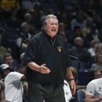 
              West Virginia coach Bob Huggins reacts during the first half of an NCAA college basketball game against Oakland in Morgantown, W.Va., Tuesday, Nov. 9, 2021. (AP Photo/Kathleen Batten)
            
