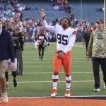 
              Cleveland Browns' Myles Garrett (95) waves to fans as he leaves the field following an NFL football game against the Cleveland Browns, Sunday, Nov. 7, 2021, in Cincinnati. (AP Photo/Aaron Doster)
            