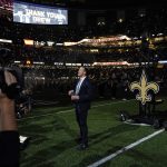 
              Former New Orleans Saints quarterback Drew Brees acknowledges the crowd as he is honored during a ceremony at halftime of an NFL football game between the New Orleans Saints and the Buffalo Bills in New Orleans, Thursday, Nov. 25, 2021. (AP Photo/Derick Hingle)
            