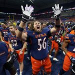 
              UTSA linebackers Caleb Lewis (54) and Avery Morris (25), along with their teammates, celebrate a win over Southern Mississippi in an NCAA college football game, Saturday, Nov. 13, 2021, in San Antonio. UTSA won 27-17 and remains unbeaten this season. (AP Photo/Eric Gay)
            