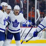 
              Toronto Maple Leafs' Nick Ritchie, from left, Auston Matthews, William Nylander and Mitchell Marner celebrate after Nylander's goal during the third period of an NHL hockey game against the Philadelphia Flyers, Wednesday, Nov. 10, 2021, in Philadelphia. (AP Photo/Matt Slocum)
            