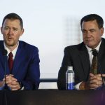 
              Lincoln Riley, left, the new head football coach of the University of Southern California, and Athletic Director Mike Bohn, answer questions during a ceremony in Los Angeles, Monday, Nov. 29, 2021. (AP Photo/Ashley Landis)
            