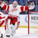 
              Detroit Red Wings goaltender Alex Nedeljkovic (39) loses his balance during the first period of an NHL hockey game against the Buffalo Sabres, Saturday, Nov. 6, 2021, in Buffalo, N.Y. (AP Photo/Jeffrey T. Barnes)
            