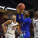 
              Texas A&M Corpus Christi guard Paige Allen (11) attempts to shoot the ball against Texas A&M during the first half of an NCAA college basketball game Tuesday, Nov. 9, 2021, in College Station, Texas. (AP Photo/Justin Rex)
            