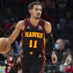 
              Atlanta Hawks Trae Young (11)  moves the ball during the first half of an NBA basketball game against the Washington Wizards on Monday, Nov. 1, 2021, in Atlanta. (AP Photo/Hakim Wright Sr.)
            