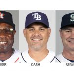 
              FILE - Baseballs Managers of the Year will be announced Tuesday, Nov. 16, 2021. Dusty Baker, Kevin Cash and Scott Servais, shown in 2021, are the finalists in the American League. (Pool via AP, File)
            