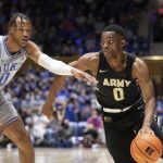
              Army's Josh Caldwell, right drives against Duke's Wendell Moore Jr. during the first half of an NCAA college basketball game in Durham, N.C., Friday, Nov. 12, 2021. (AP Photo/Ben McKeown)
            