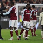 
              West Ham's manager David Moyes hugs players at the end of the English Premier League soccer match between West Ham United and Liverpool at the London stadium in London, England, Sunday, Nov. 7, 2021. (AP Photo/Ian Walton)
            