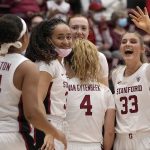 
              Stanford guard Hannah Jump (33) celebrates with teammates after making a 3-pointer against Morgan State during the second half of an NCAA college basketball game in Stanford, Calif., Thursday, Nov. 11, 2021. Stanford won 91-36. (AP Photo/Tony Avelar)
            