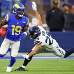 INGLEWOOD, CALIFORNIA - DECEMBER 21: Brandon Powell #19 of the Los Angeles Rams runs past John Reid #29 of the Seattle Seahawks in the first quarter of the game at SoFi Stadium on December 21, 2021 in Inglewood, California. (Photo by Sean M. Haffey/Getty Images)
