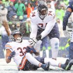 SEATTLE, WASHINGTON - DECEMBER 26: David Montgomery #32 of the Chicago Bears runs the ball for a touchdown during the second quarter against the Seattle Seahawks at Lumen Field on December 26, 2021 in Seattle, Washington. (Photo by Abbie Parr/Getty Images)