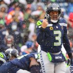 SEATTLE, WASHINGTON - DECEMBER 26: Russell Wilson #3 of the Seattle Seahawks calls a play at the line during the second quarter against the Chicago Bears at Lumen Field on December 26, 2021 in Seattle, Washington. (Photo by Abbie Parr/Getty Images)