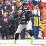 SEATTLE, WASHINGTON - DECEMBER 26: Russell Wilson #3 of the Seattle Seahawks looks to throw the ball during the second quarter against the Chicago Bears at Lumen Field on December 26, 2021 in Seattle, Washington. (Photo by Abbie Parr/Getty Images)