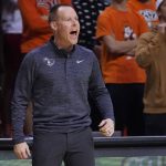
              Xavier head coach Travis Steele shouts in the second half of an NCAA college basketball game against Oklahoma State, Sunday, Dec. 5, 2021, in Stillwater, Okla. (AP Photo/Sue Ogrocki)
            