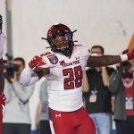 
              Texas Tech running back Tahj Brooks (28) celebrates after scoring a touchdown against Mississippi State in the first half of the Liberty Bowl NCAA college football game Tuesday, Dec. 28, 2019, in Memphis, Tenn. (AP Photo/Mark Humphrey)
            