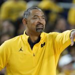 
              Michigan head coach Juwan Howard gives directions against San Diego State in the first half of an NCAA college basketball game in Ann Arbor, Mich., Saturday, Dec. 4, 2021. (AP Photo/Paul Sancya)
            