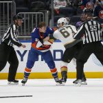 
              New York Islanders' Kieffer Bellows (20) and Vegas Golden Knights' Max Pacioretty (67) fight during the second period of an NHL hockey game Sunday, Dec. 19, 2021, in Elmont, N.Y. (AP Photo/John Munson)
            