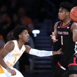 
              Texas Tech guard Terrence Shannon Jr. looks to pass around Tennessee guard Kennedy Chandler during the first half of an NCAA college basketball game in the Jimmy V Classic on Tuesday, Dec. 7, 2021, in New York. (AP Photo/Adam Hunger)
            