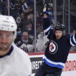 
              Winnipeg Jets' Evgeny Svechnikov (71) celebrates his goal against the Toronto Maple Leafs during the second period of NHL hockey game action in Winnipeg, Manitoba, Sunday, Dec. 5, 2021. (Fred Greenslade/The Canadian Press via AP)
            