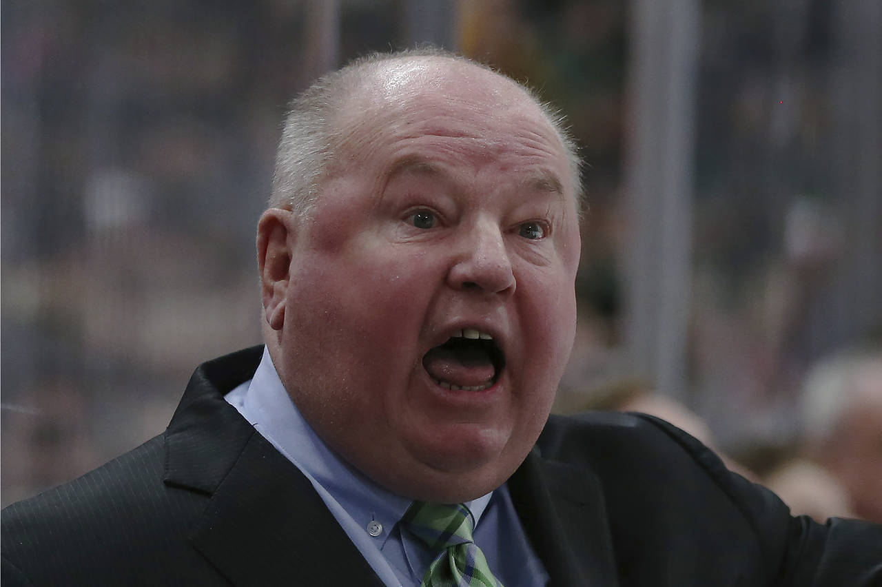 FILE - Minnesota Wild's head coach Bruce Boudreau shouts after a penalty call in the second period ...