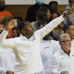 
              Oklahoma State head coach Mike Boynton Jr. gestures in the second half of an NCAA college basketball game against Cleveland State, Monday, Dec. 13, 2021, in Stillwater, Okla. (AP Photo/Sue Ogrocki)
            