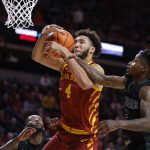 
              Iowa State forward George Conditt (4) pulls down a rebound as he is fouled by Chicago State guard Dominique Alexander (2) during the first half of an NCAA college basketball game Tuesday, Dec. 21, 2021, in Ames, Iowa. (AP Photo/Matthew Putney)
            