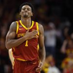 
              Iowa State guard Izaiah Brockington (1) celebrates after a 3-point basket during the first half of the team's NCAA college basketball game against Iowa, Thursday, Dec. 9, 2021, in Ames, Iowa. (AP Photo/Matthew Putney)
            
