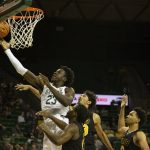 
              Baylor forward Jonathan Tchamwa Tchatchoua (23) goes up for a layup in the first half of an NCAA college basketball game against Arkansas Pine Bluff in Waco, Texas, Saturday, Dec. 4, 2021. (AP Photo/Emil Lippe)
            