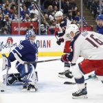 
              Columbus Blue Jackets centre Max Domi (16) scores on Toronto Maple Leafs goaltender Jack Campbell (36) during the third period of an NHL hockey game Tuesday, Dec. 7, 2021, in Toronto. (Cole Burston/The Canadian Press via AP)
            