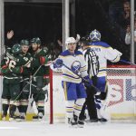
              Minnesota Wild left wing Kirill Kaprizov, center, is surrounded by teammates after scoring a goal against the Buffalo Sabres during the second period of an NHL hockey game Thursday, Dec. 16, 2021, in St. Paul, Minn. (AP Photo/Stacy Bengs)
            